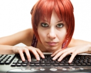 Internet addiction - tired woman surfing the web